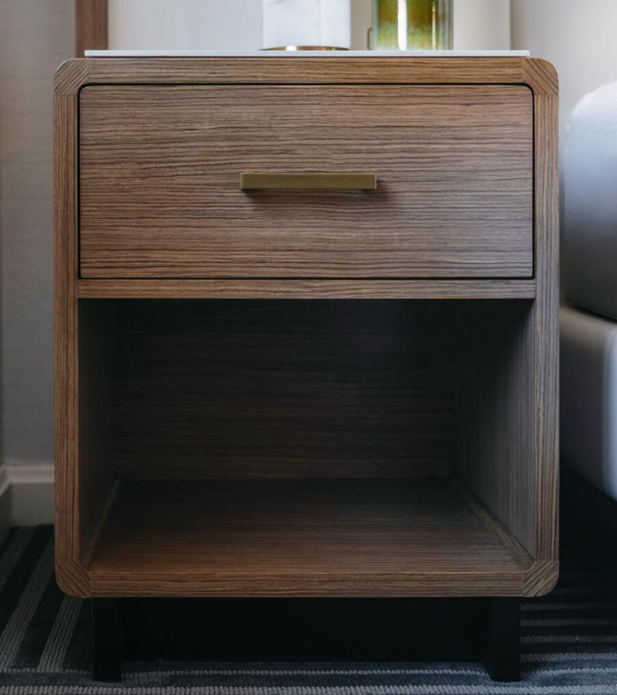 Walnut bedside table with brass pull in Capital Hilton guestroom renovation
