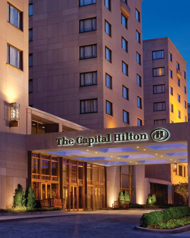 Capital Hilton hotel from street view at night in Washington, DC