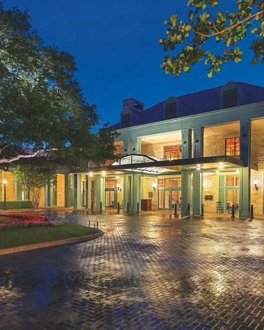 Hyatt Regency Hill Country hotel from street view at night in San Antonio, Texas