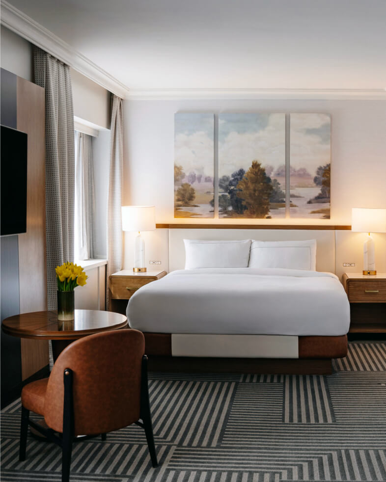 Capital Hilton guestroom renovation with modern Art Deco design and custom furniture