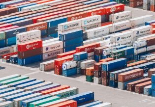 Many colorful shipping containers at port